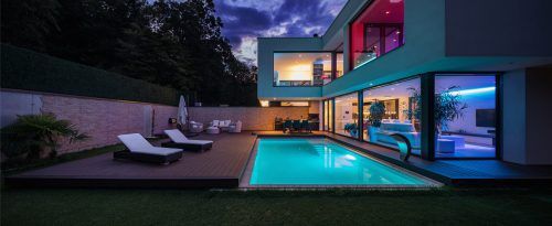 Modern,Villa,With,Colored,Led,Lights,At,Night.,Nobody,Inside